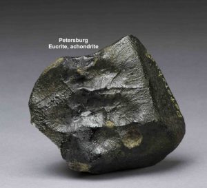 Click the meteorite to learn more about achondrites!